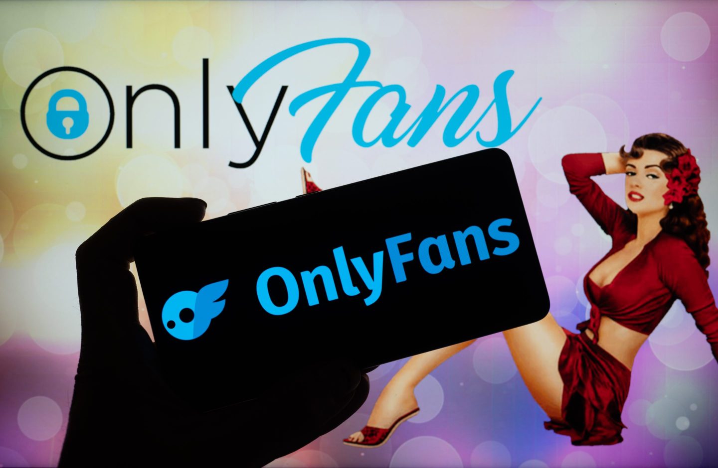 OnlyFans logo displayed on a smart phone with onlyFans seen in the background, in this photo illustration. On 07 September 2023 in Brussels, Belgium.  (Photo illustration by Jonathan Raa/NurPhoto via Getty Images)