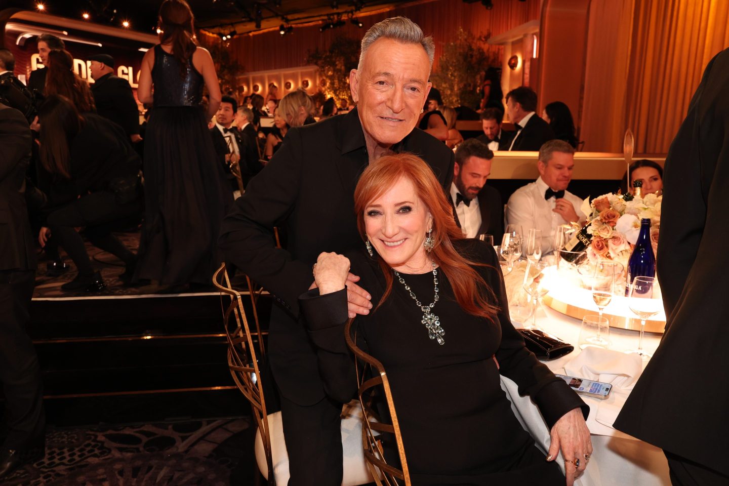 Bruce Springsteen and Patti Scialfa sitting down at the Golden Globes