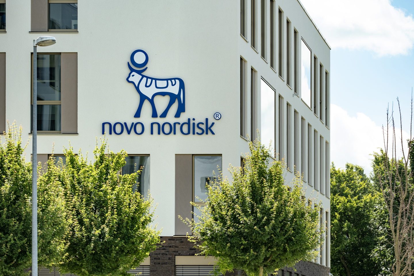 Novo Nordisk advertising logo on facade building, Danish pharmaceutical healthcare giant Novo Nordisk AS, production innovative drugs, obesity treatment Ozempic, Mainz, Germany  June 15, 2024