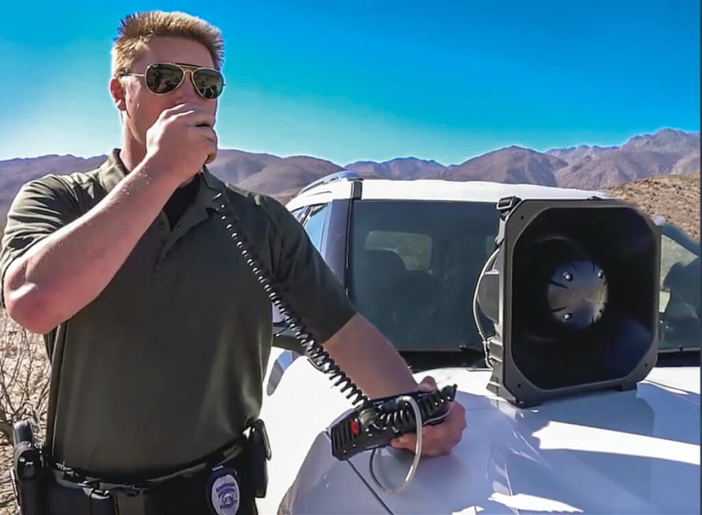 Police issusing orders with a mobile LRAD system.