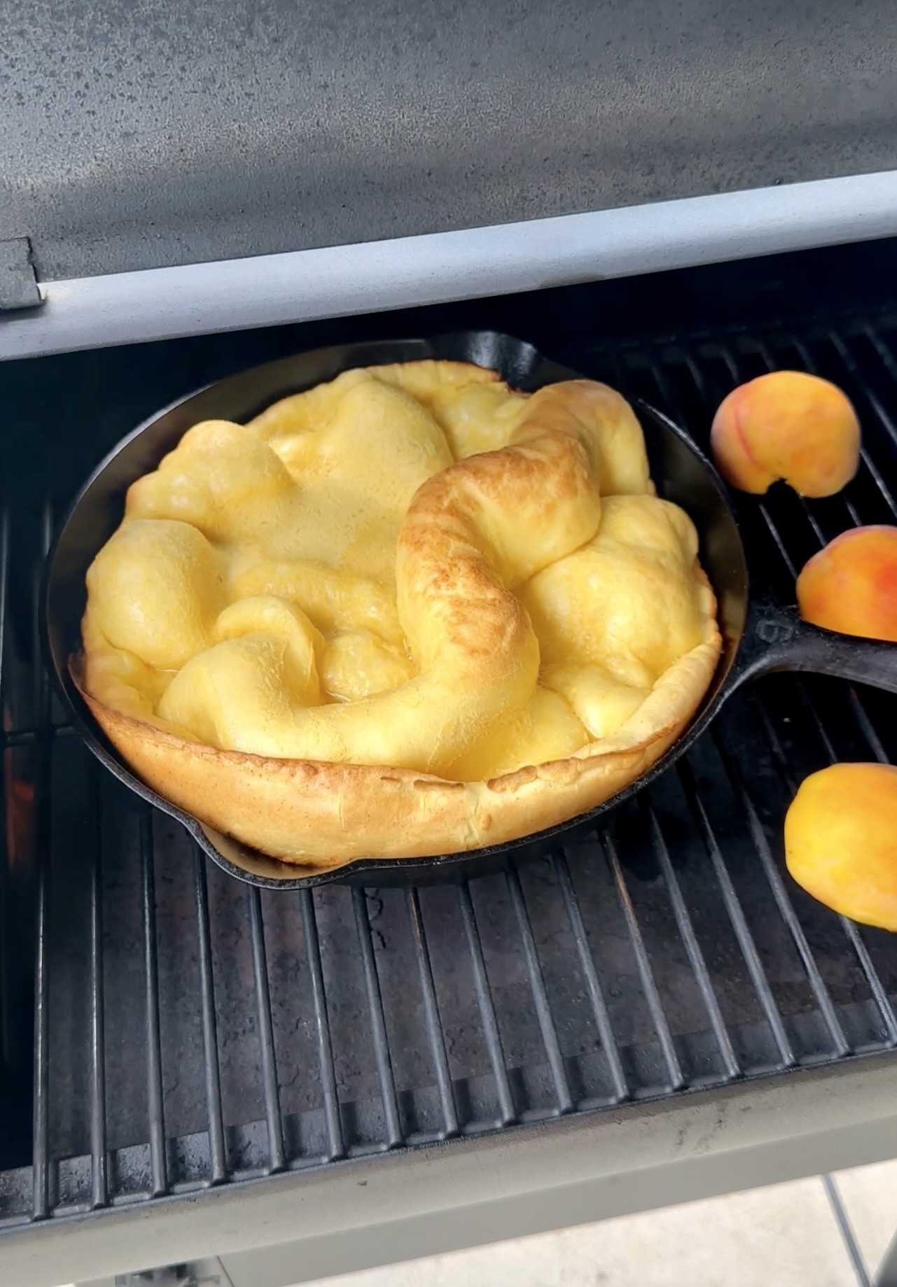 grilled dutch baby with peaches and cream