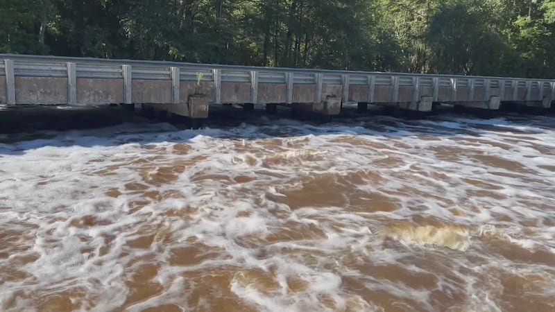 Water at Cypress Lake has not breached dam, flash flood warning continues