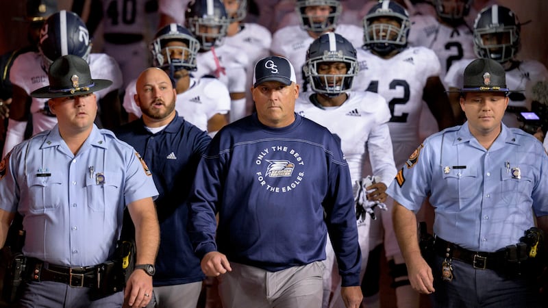 FILE - Georgia Southern head coach Clay Helton enters the field with his team before an NCAA...