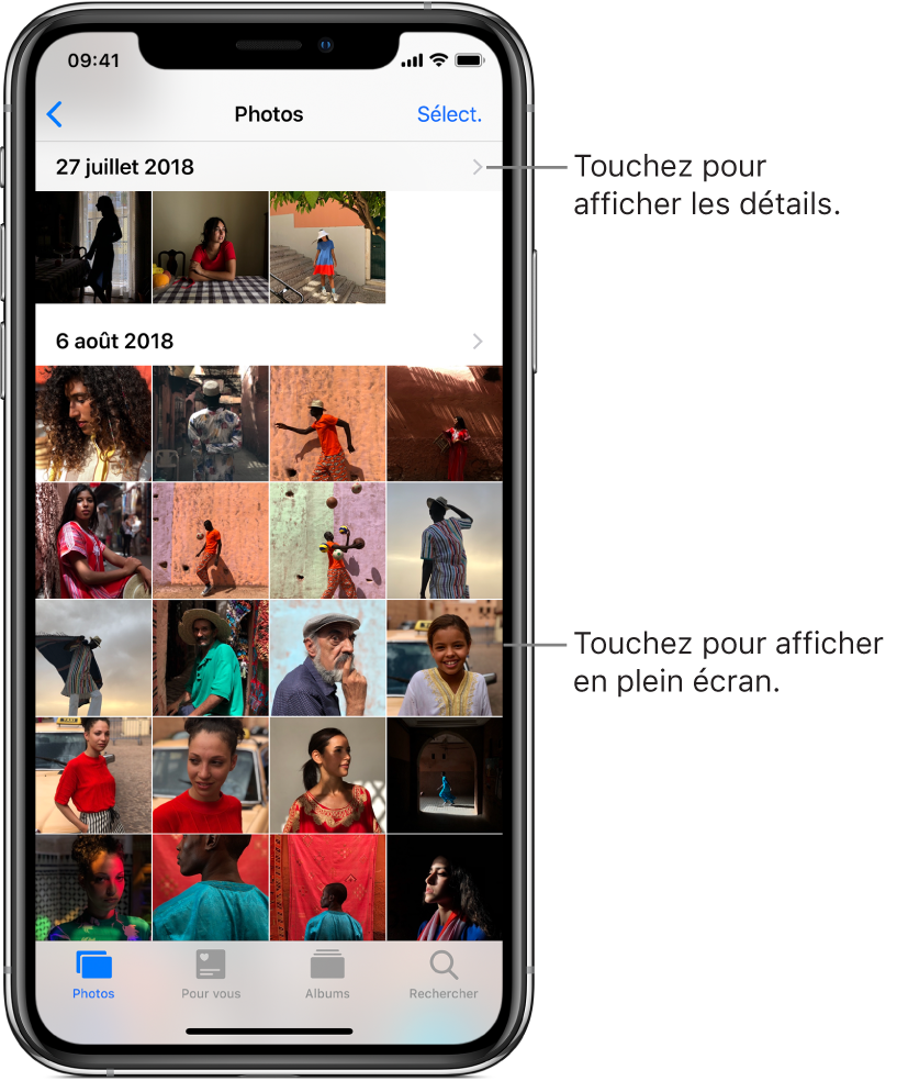 L’app Photos ; en bas de l’écran, de gauche à droite, se trouvent les onglets Photos, Pour vous, Albums et Rechercher. L’onglet Photos est sélectionné et l’écran au-dessus affiche une grille de vignettes de photo regroupées en moments. Au-dessus de chaque moment se trouve la date à laquelle les photos ont été prises. Touchez la date pour afficher les détails du moment. Touchez la vignette d’une photo pour afficher celle-ci en plein écran.