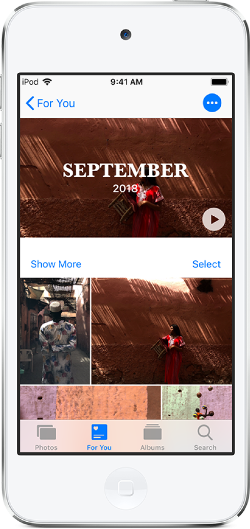 شاشة الذكريات تعرض فيديو في الأعلى. أسفل الفيديو توجد مجموعة من الصور.