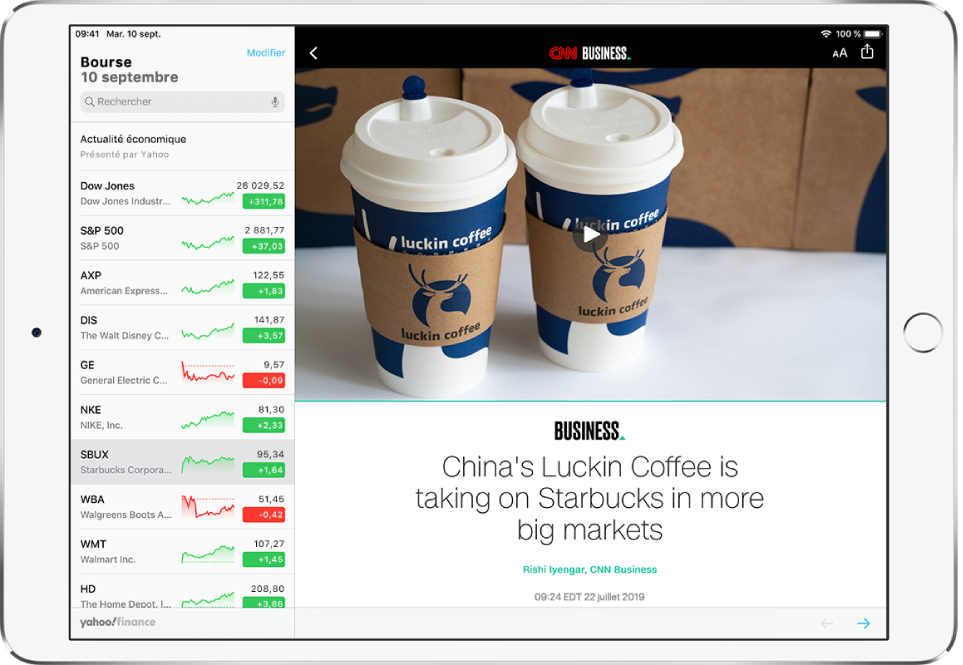 L’écran Bourse en orientation paysage. Le champ de recherche se trouve dans le coin supérieur gauche. Dans le coin supérieur gauche de l’article se trouve le bouton Retour, permettant de retourner à l’app Bourse. En haut à droite de l’article se trouvent les boutons « Format de texte » et Partager. Dans l’angle inférieur droit se trouve le bouton « Page suivante ».
