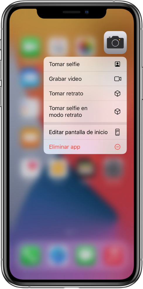 La pantalla de inicio difuminada, mostrando el menú de acciones rápidas de Cámara, debajo de la app Cámara.