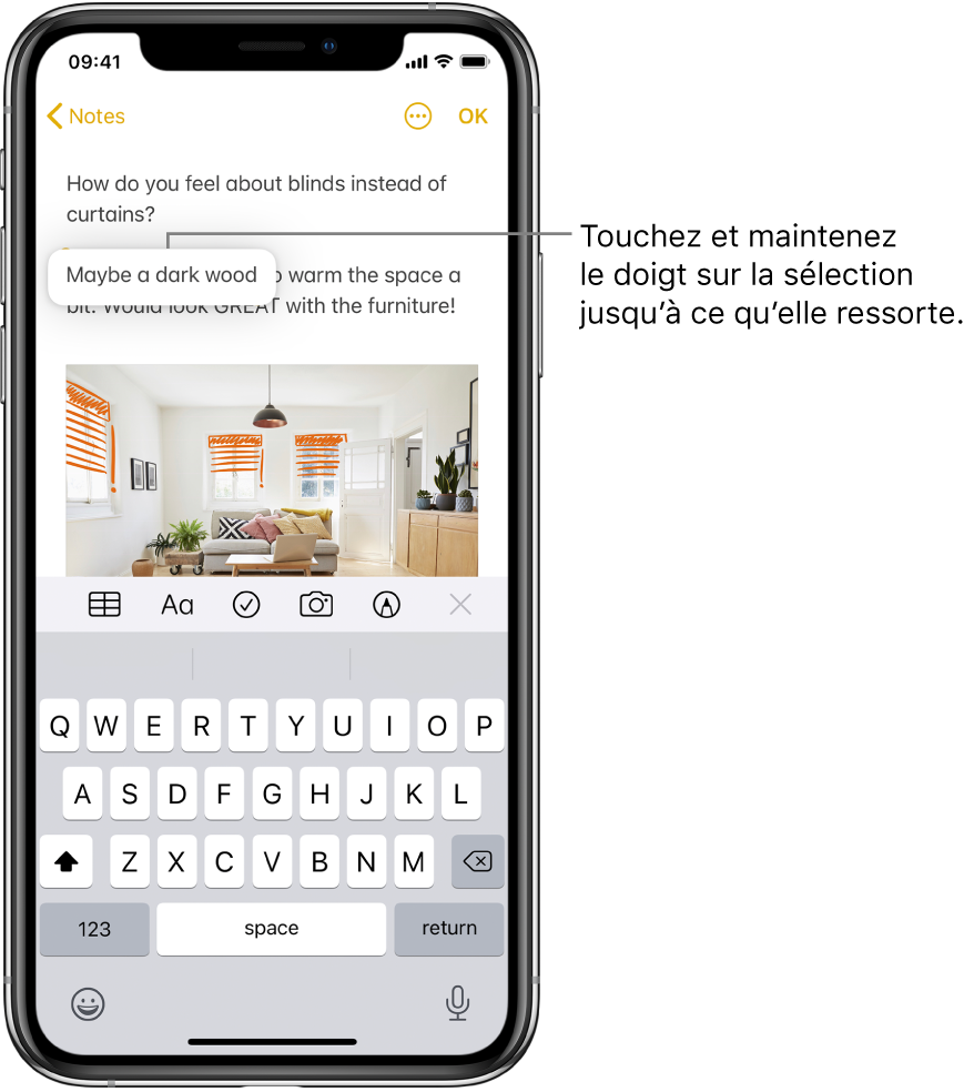 Un utilisateur touche et maintient son doigt sur une phrase sélectionnée ; elle semble alors se soulever.