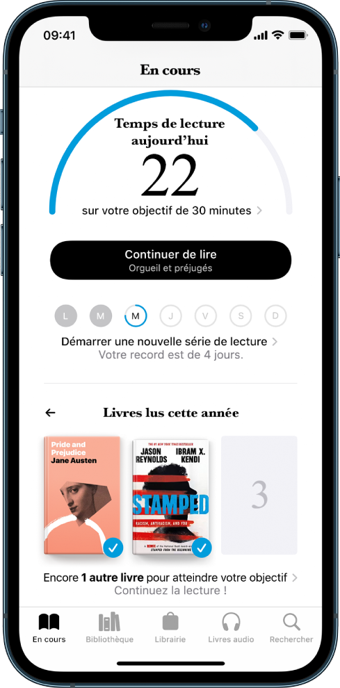 La section « Objectifs de lecture » dans « En cours ». Le compteur de lecture indique que 10 minutes ont été réalisées sur un objectif de 20 minutes. Sous le compteur se trouve un bouton « Continuez la lecture » et des cercles qui montrent les jours de la semaine, du dimanche au samedi. Un contour bleu autour d’un cercle indique la progression de la lecture pour ce jour. Au bas de la page se trouvent les couvertures des livres lus cette année.