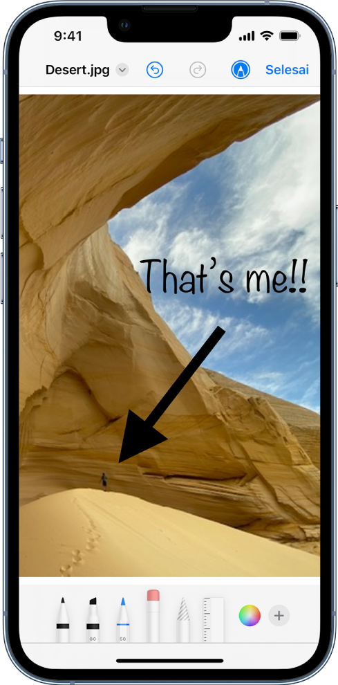 Imej sedang diedit dengan Penanda. Di bawah imej, dari kiri ke kanan ialah butang untuk alat Penanda: pen lukis, pemadam, alat pilihan, warna, butang untuk menambah kotak teks, tandatangan anda dan bentuk, serta untuk memilih Kanta Pembesar.