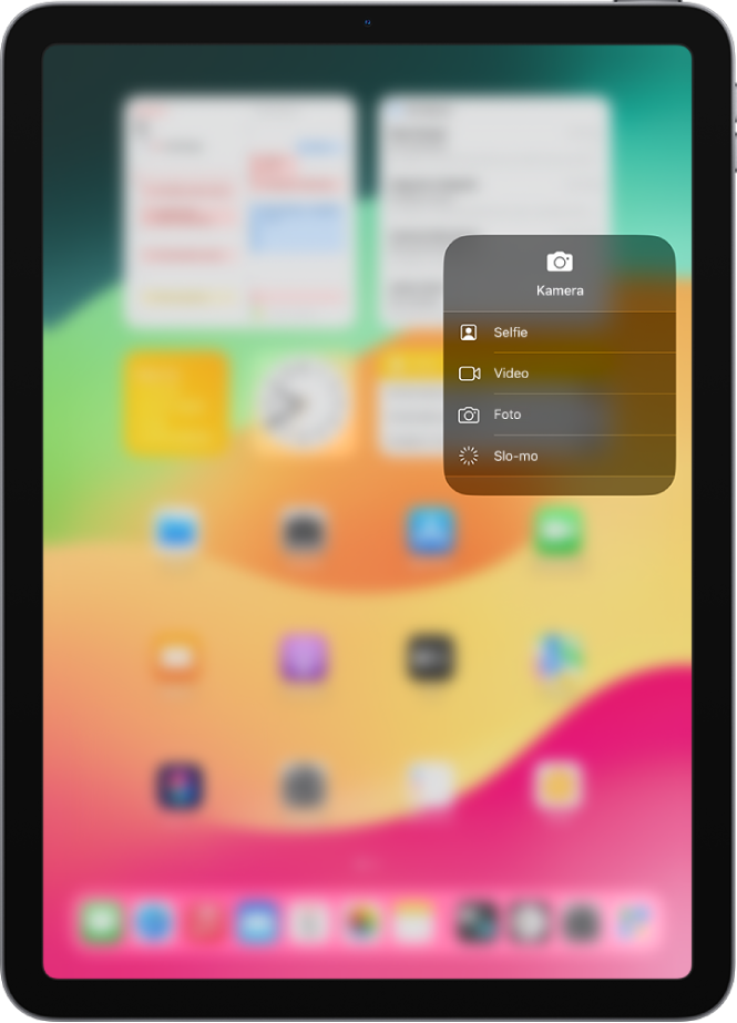 Layar menampilkan pilihan Kamera tambahan yang tersedia di Pusat Kontrol saat Anda menyentuh dan menahan kontrol Kamera. Pilihan adalah Selfie, Video, Foto, dan Slo-mo.