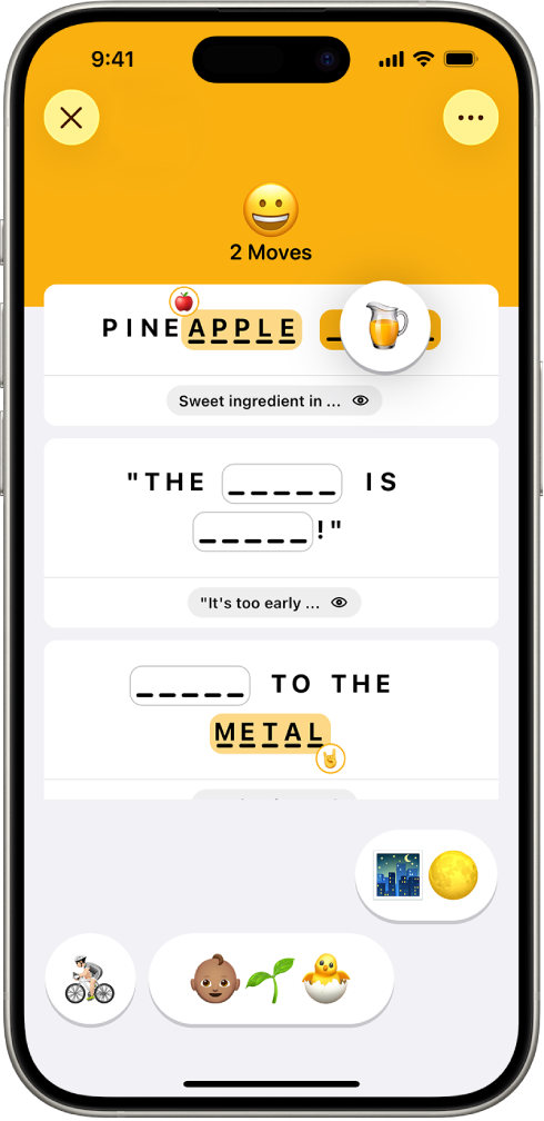 ఎమోజి గేమ్, కదలికల సంఖ్యను చూపుతోంది, రెండు ఎమోజీలను సమాధానాలుగా ఉంచారు, ఒకటి సమాధానం లేని ప్రదేశంలో ఉంచారు.