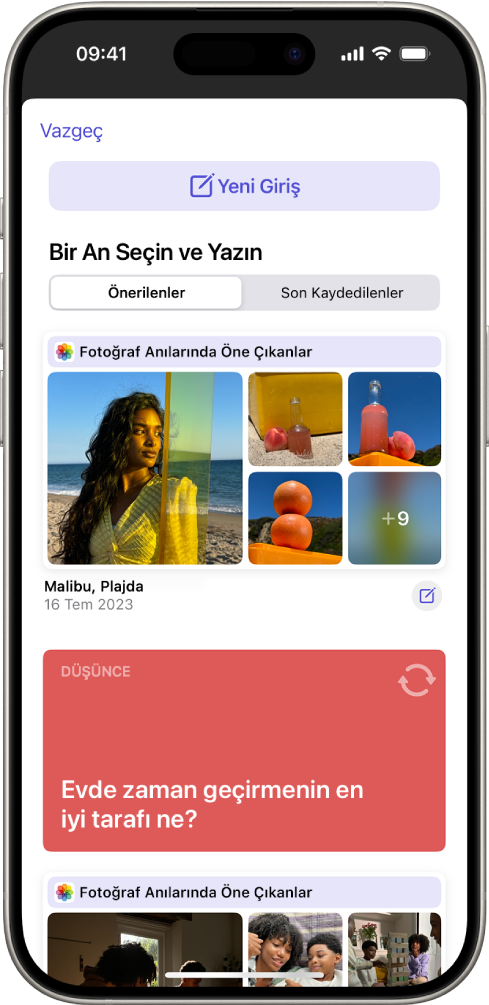 En üstte Yeni Giriş düğmesini ve altta günlük önerilerini gösteren bir ekran.