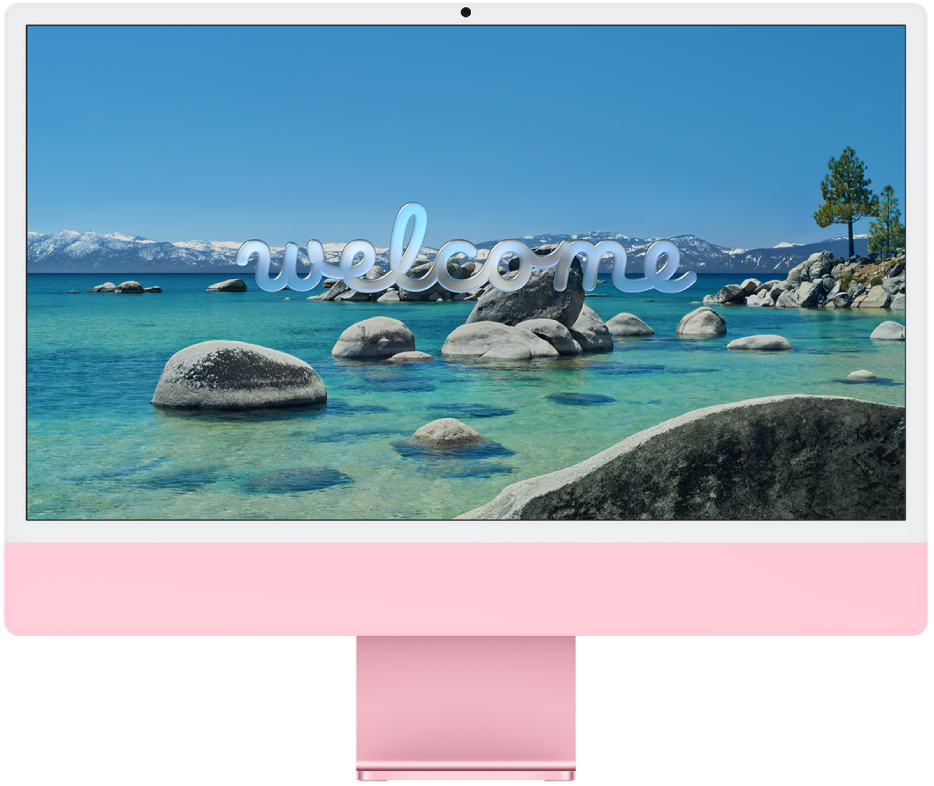 iMac dengan “Selamat Datang” di layar.