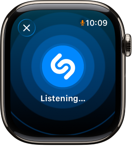 Zaslon, ki prikazuje naslov in izvajalca skladbe, ki jo je prepoznala funkcija Prepoznavanje glasbe. Spodaj desno je gumb za predvajanje.