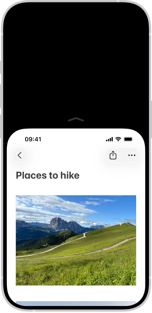 Tela do iPhone com a Alcançabilidade ativada. A parte superior da tela foi movida para baixo, para ficar ao alcance do polegar.