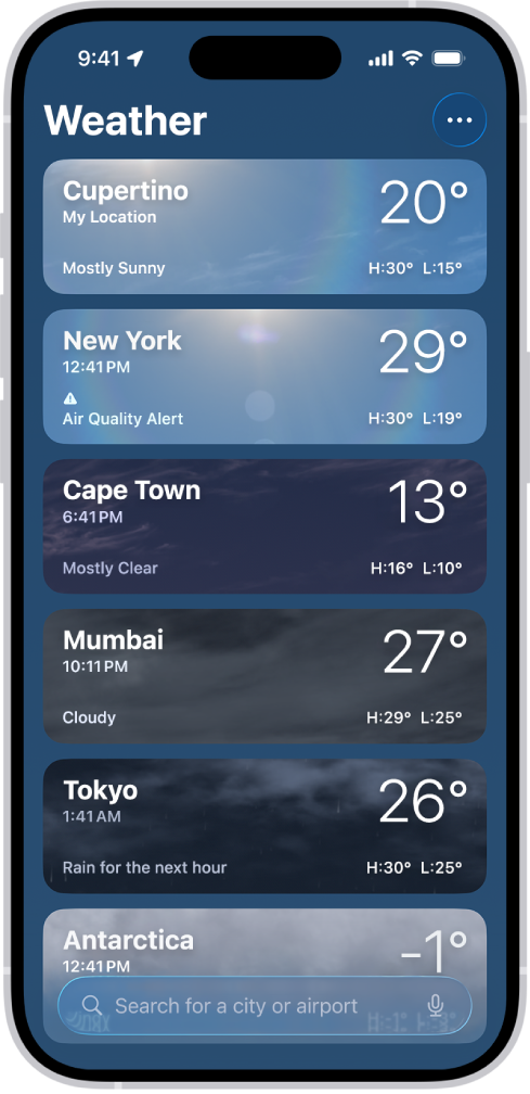 Aplikacioni Weather që tregon një listë të qyteteve me kohën aktuale, temperaturën, parashikimin dhe temperaturat e larta dhe të ulëta. Në fund të ekranit është fusha e kërkimit dhe në këndin e sipërm djathtas është butoni More.