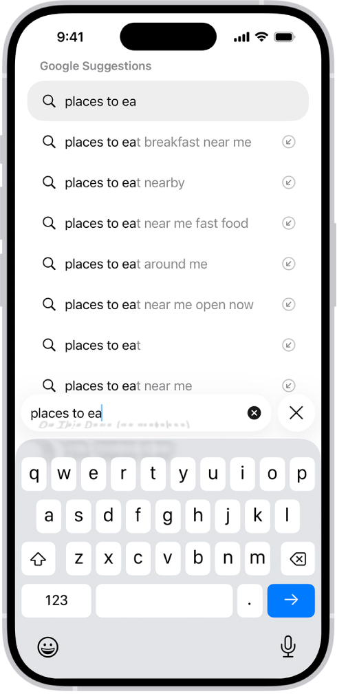 Một màn hình tìm kiếm của Safari, với bàn phím ảo ở cuối màn hình. Phía trên bàn phím, trường tìm kiếm chứa văn bản và các gợi ý tìm kiếm liên quan được liệt kê ở trên.