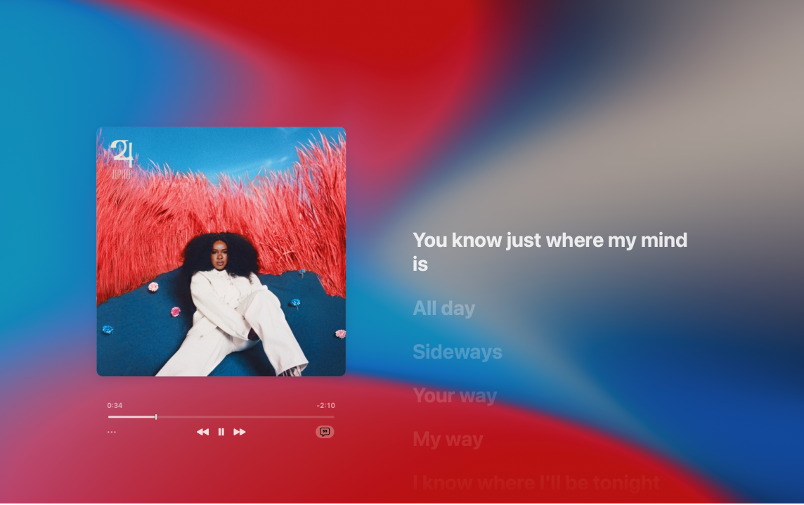 Müzikle eşzamanlı olarak ekranda görünen şarkı sözleri sağ tarafta olmak üzere çalmakta olan bir parça ile Tam Ekran Oynatıcı.