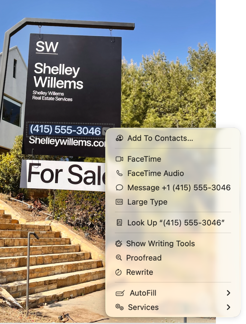 Foto d’un cartell de venda immobiliària on es pot veure el número de telèfon de l’agent immobiliari seleccionat com a text dinàmic i un menú amb les opcions per afegir el número de telèfon a l’app Contactes, trucar al número, fer una trucada del FaceTime, enviar un missatge de text i més.