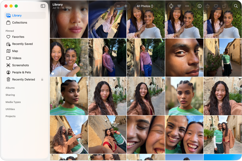 Fotoğraflar’ın ana penceresi, sol tarafta kenar çubuğunda seçili Arşiv’i, sağ tarafta ızgaradaki fotoğrafları ve en üstte araç çubuğunu gösteriyor.