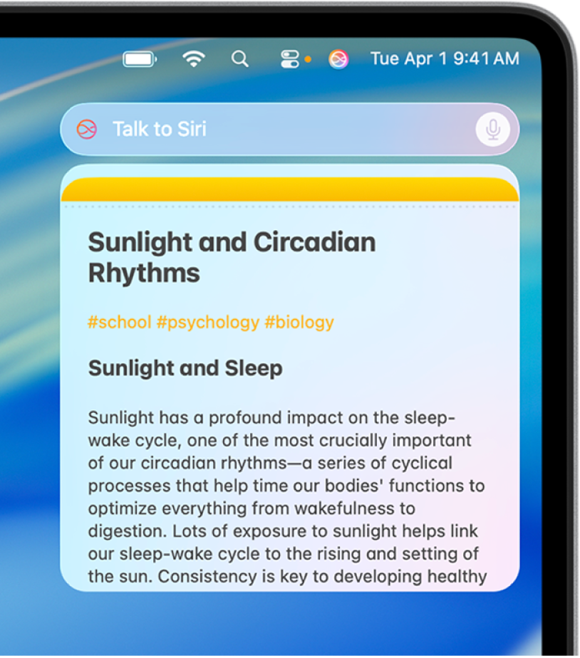 Trường yêu cầu Siri và phản hồi ở góc trên cùng bên phải của màn hình nền máy Mac.