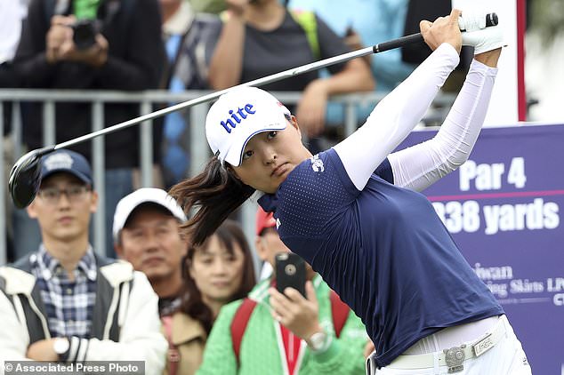 In this October 2019, file photo, Jin Young Ko of South Korea watches her tee shot on the first hole during the first round of the Taiwan Swinging Skirts LPGA tournament at the Miramar Golf Country Club in New Taipei City, Taiwan. Ko figures to be plenty rested whenever the LPGA Tour resumes. Ko left the CME Group Tour Championship in Naples, Florida, on November 24 as the No. 1 player in women's golf, capping off her four-win, two-major season as the LPGA player of the year and winner of the Vare Trophy for lowest scoring average. The plan was to return for the Asia swing in mid-February and work her way into the season. She's still waiting.