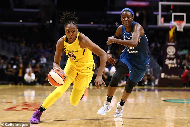 Nneka Ogwumike of the Sparks handles the ball against Temi Fagbenle of the Lynx during a WNBA basketball game at Staples Center on August 20, 2019 in Los Angeles