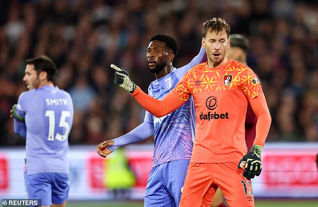 Bournemouth goalkeeper Neto (orange) had to be withdrawn through injury at half-time