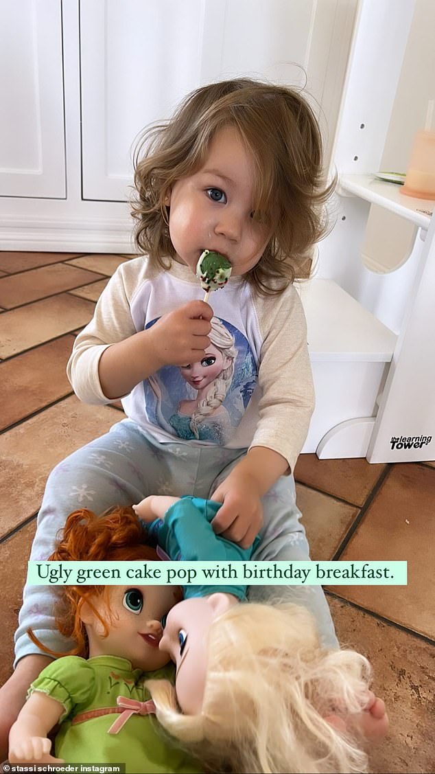 Frozen in time: Mom let her baby girl eat an 'ugly green cake pop with her birthday breakfast' which she enjoyed while dressed in her Frozen pajamas