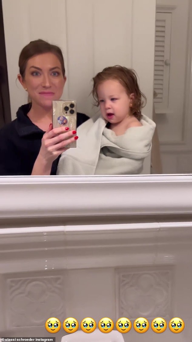 Quality time: Later, mom documented Hartford's bath time with a mirror selfie