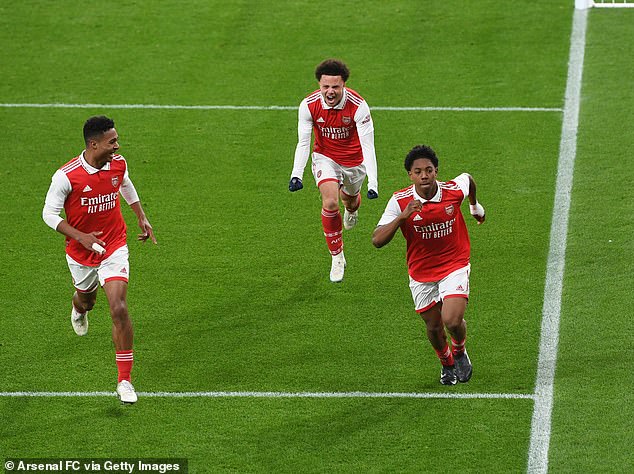 Myles Lewis-Skelly (right) celebrates his winner as Arsenal beat Manchester City in the last minute of extra time to book their place in the FA Youth Cup final