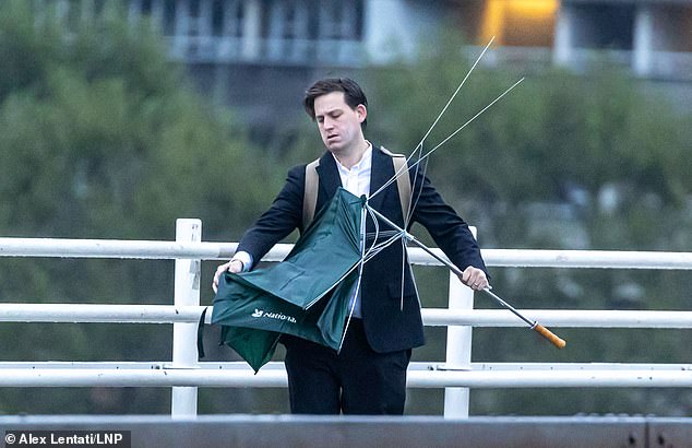 LONDON: Commuters were seen struggling with their umbrellas as the storm threatens to cause chaos in England