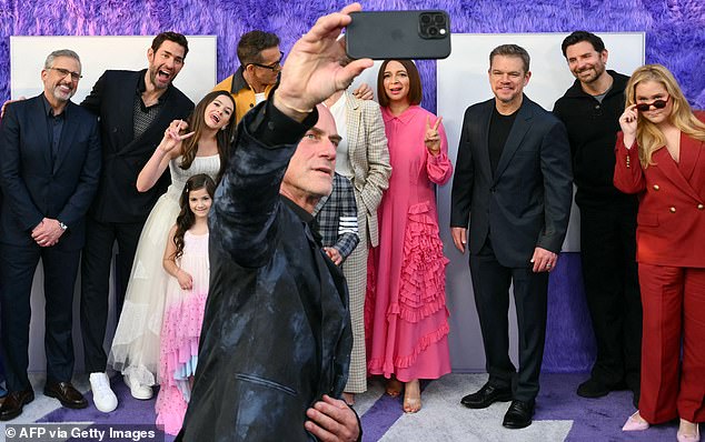 Cooper was pictured alongside (L-R) Steve Carell, writer/director John Krasinski, Cailey Fleming, Audrey Hoffman, Fiona Shaw, Maya Rudolph, Matt Damon and Amy Schumer, with Christopher Meloni taking a selfie. Cooper was in Ellen DeGeneres' 2014 Oscars selfie