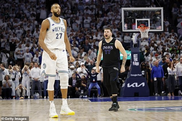 Luke Doncic celebrates his game-winning 3-pointer by talking trash to Rudy Gobert