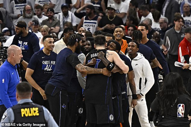 After the swish, Doncic flexed at the stunned crowd as his teammates swarmed him