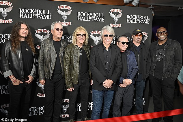 The star added a set of dark-tinted aviator glasses to the mix as he was joined by band members Phil X, Hugh McDonald, David Bryan, Tico Torres, John Shanks and Everett Bradley