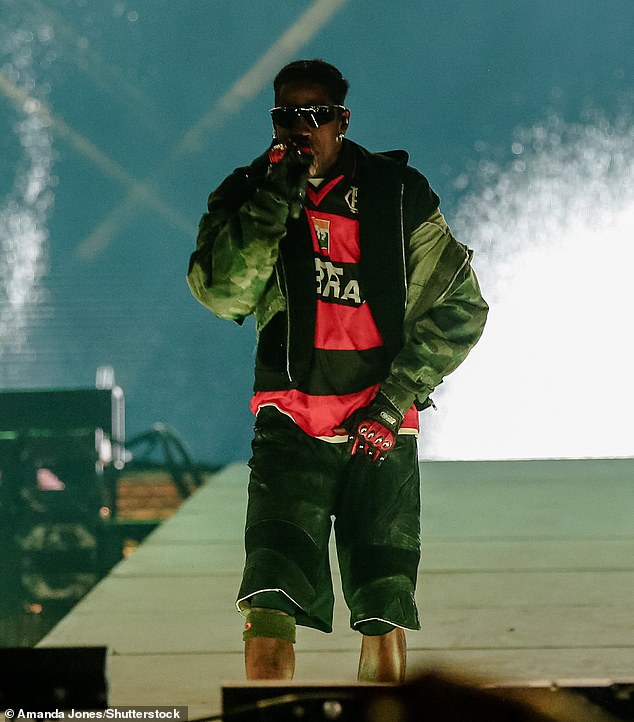 Travis Scott was seen performing in Chicago on June 14, 2024 - days before his arrest