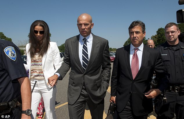 Here, Burke (second from right), is pictured escorting his client, NBA all-star and then-Brooklyn Nets head coach, Jason Kidd, from court following a plea deal he struck after Kidd was busted for drunk driving that resulted in a single vehicle crash in Southampton