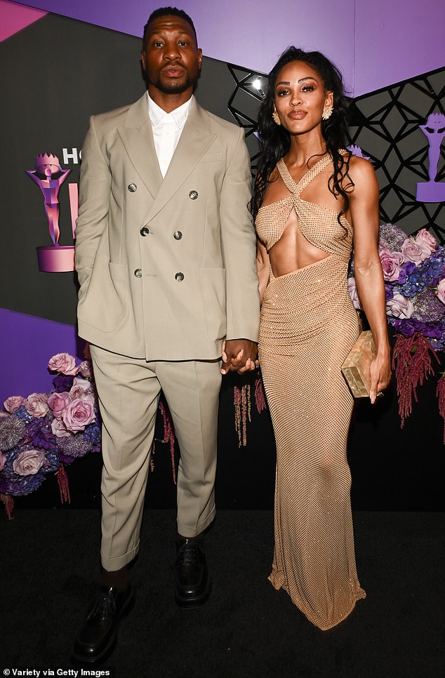 Jonathan Majors sported a double-breasted beige suit as he walked the red carpet with Meagan Good