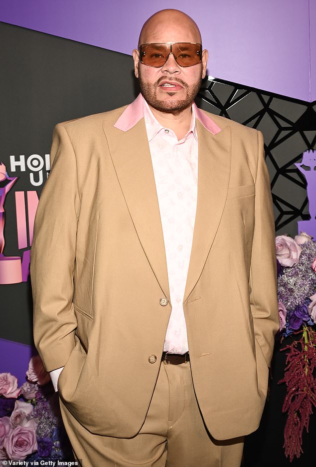 Fat Joe donned a tan suit with pink lapels and a white checkered shirt