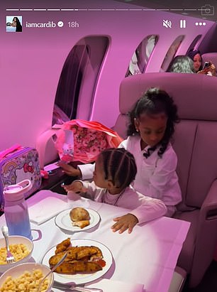 Another video showed both Kulture and her little brother, Wave, sitting on the same seat as they snacked on a tasty dinner