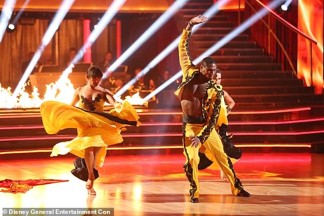 'Absolutely devastated by the loss of my dear friend and fellow #dwts co-star, Jacoby Jones, who passed away in his sleep early this morning,' Cheryl captioned a clip of the fiery trio dance