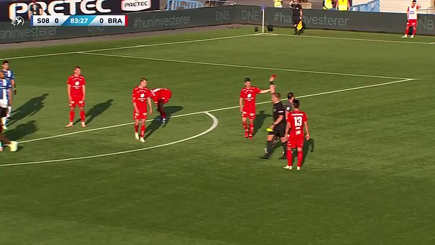 This is the shocking moment a referee in the Norwegian league sends off physio Joao Ferreira for running onto the pitch and then arguing back when he gets ordered to leave the pitch