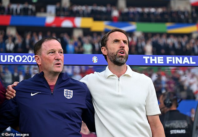 Southgate (right) was followed out the door by his assistant Steve Holland (left), who reportedly had a falling out with the Arsenal defender