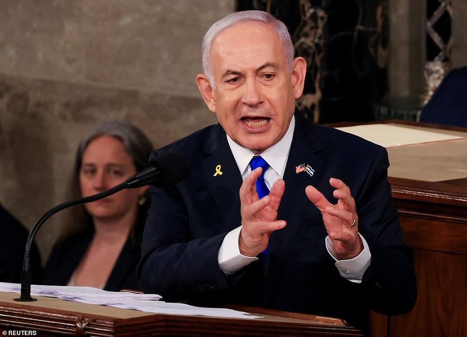 'I wish to salute the fraternity brothers at the University of North Carolina for protecting the American flag against these anti-Israel protesters,' he said to applause and chants of 'USA' from Congress. Meanwhile, police estimated that over 10,000 protestors descended upon Capitol Hill to call for an end to the 'genocide' in Gaza and demand a ceasefire.