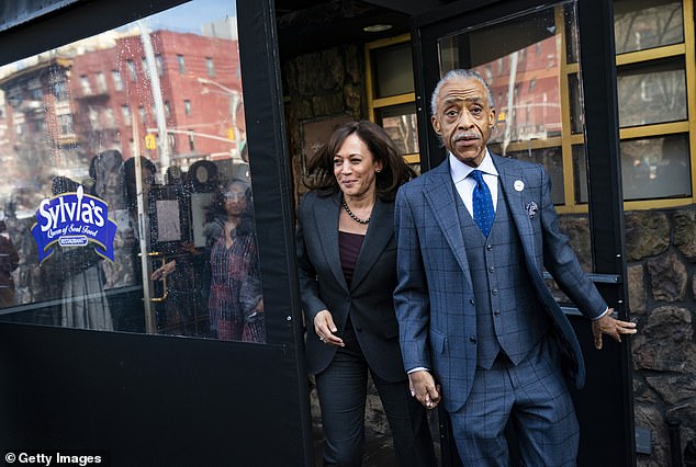 Sen. Kamala Harris (D-CA) and Rev. Al Sharpton discuss issues at a restaurant in Harlem