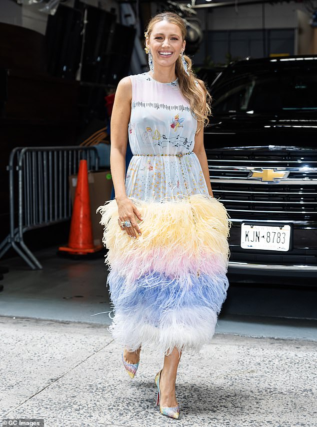 The star seemed to be a fan of New York designer Dauphinette as she stepped out in a blue and yellow dress which boasted a dramatic feathered skirt