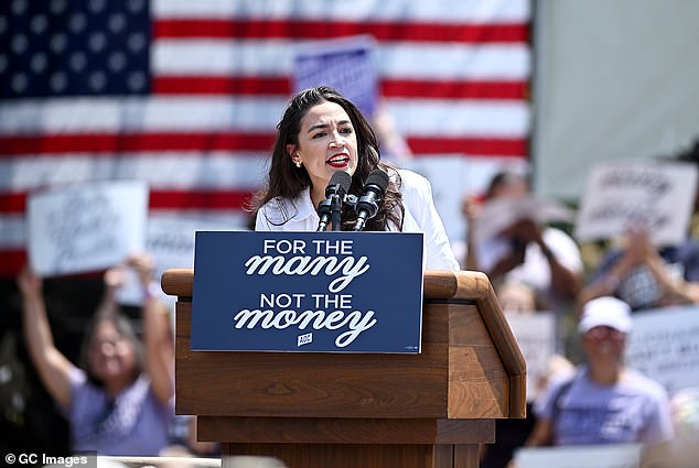 Rep. Alexandria Ocasio-Cortez is basking in the newfound Democratic unity, remarking that it's 'really kind of nuts' both her and centrist Sen. Joe Manchin approve of Kamala Harris ' VP pick