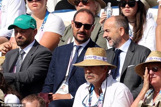 Crown Prince Haakon appeared unfazed as he attended an equestrian event in Paris on Tuesday, after his stepson had been arrested and charged